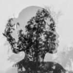 Endless Legend 2 - Silhouette of Asian woman behind tree branch near endless ocean