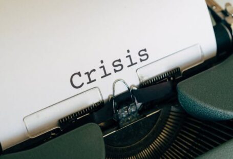 Economy Management - White Paper On A Vintage Typewriter