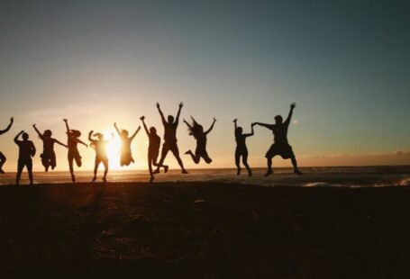 Community Feedback - Silhouette Photography of Group of People Jumping during Golden Time
