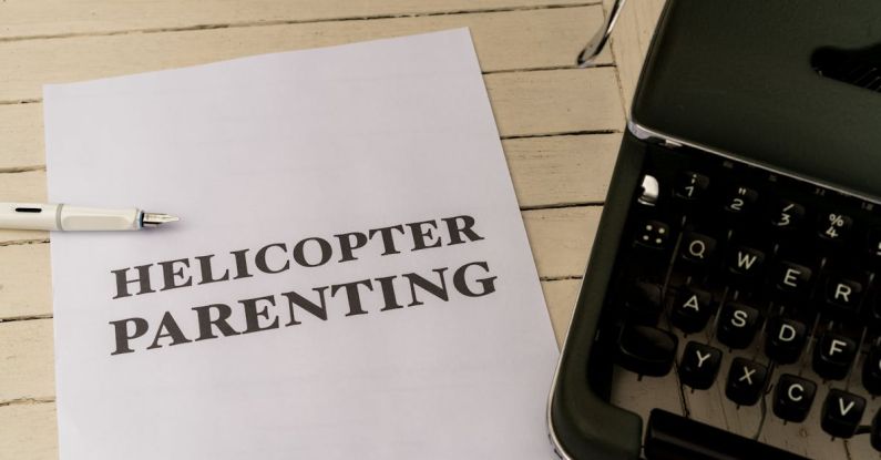 Micromanagement - A typewriter with the words helicopter parenting on it
